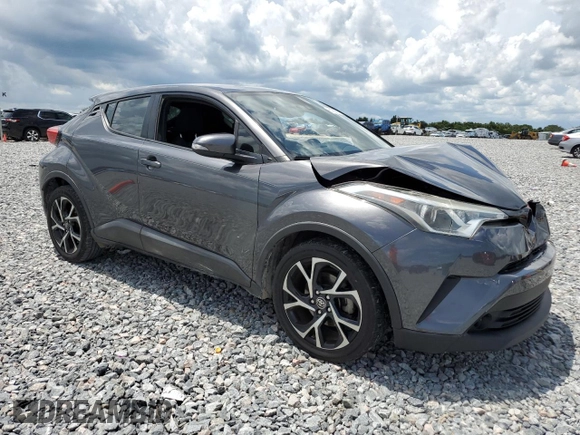 2018 Toyota C-HR XLE with VIN NMTKHMBX7JR000609, listed as a Copart auction lot 61997655 with 100,062 mi miles and Salvage title. Bid and sale history available at DreamBid. Image 4.