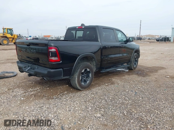 2020 Ram 1500 Rebel with VIN 1C6SRFLT5LN113514, listed as a IAAI auction lot 41718662 with 56,730 mi miles and . Bid and sale history available at DreamBid. Image 4.