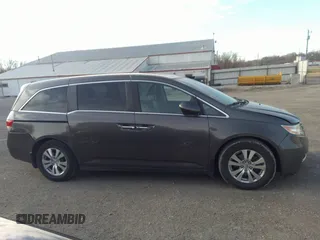 2014 Honda Odyssey EX-L with VIN 5FNRL5H64EB037646, listed as a IAAI auction lot 41786768 with 116,491 mi miles and . Bid and sale history available at carsss.com. Image 13.