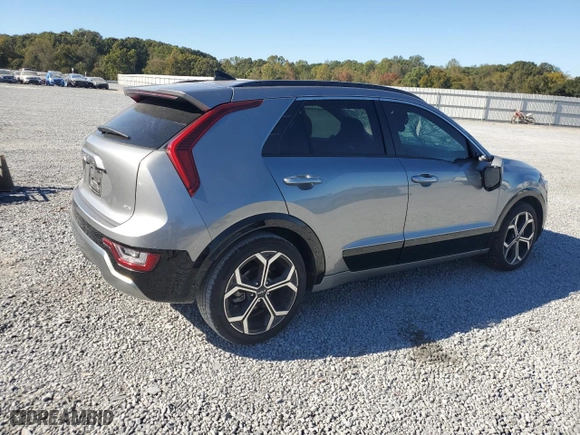 2023 Kia Niro SX Touring with VIN KNDCT3LE3P5083885, listed as a Copart auction lot 76116824 with 10,401 mi miles and Salvage Title. Bid and sale history available at carsss.com. Image 3.