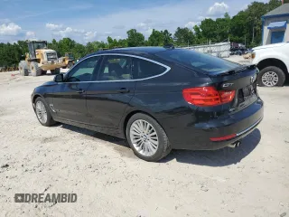 2014 BMW 3 Series 328i Gran Turismo xDrive with VIN WBA3X5C56ED557120, listed as a Copart auction lot 55584315 with 154,405 mi miles and Salvage title. Bid and sale history available at DreamBid. Image 2.