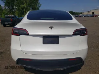 2024 Tesla Model Y with VIN 7SAYGDED9RF133701, listed as a Copart auction lot 64060785 with Not provided miles and Salvage title. Bid and sale history available at DreamBid. Image 6.