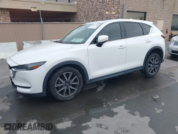 2018 Mazda CX-5 Grand Touring with VIN JM3KFADM1J0309995, listed as a IAAI auction lot 41977003 with 75,303 mi miles. Bid and sale history available at carsss.com. Image 2.