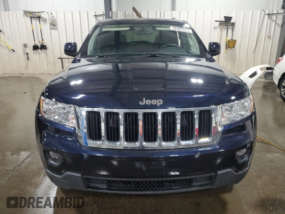 2011 Jeep Grand Cherokee Laredo with VIN 1J4RR4GG9BC555662, listed as a Copart auction lot 52447235 with 151,695 mi miles and Salvage Title. Bid and sale history available at carsss.com. Image 5.