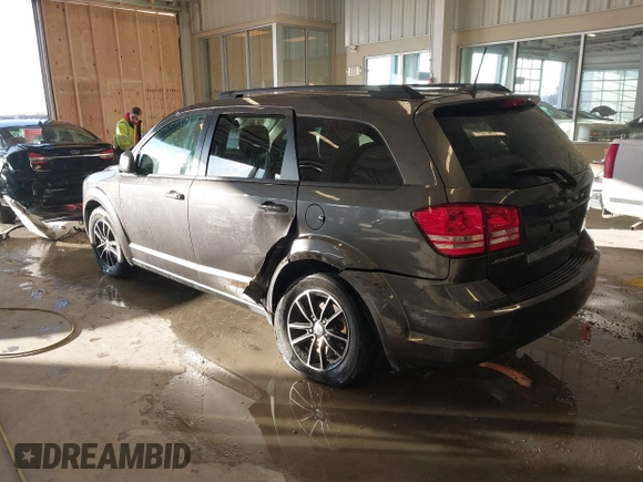 2018 Dodge Journey SE with VIN 3C4PDCAB1JT519745, listed as a IAAI auction lot 41366307 with 131,436 mi miles. Bid and sale history available at carsss.com. Image 3.