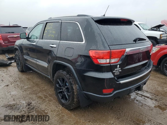 2013 Jeep Grand Cherokee Overland with VIN 1C4RJFCT9DC615096, listed as a Copart auction lot 86817074 with 112,421 mi miles and Salvage Title. Bid and sale history available at carsss.com. Image 2.