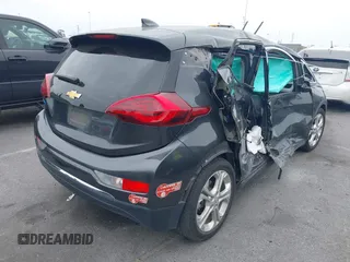 2018 Chevrolet Bolt EV LT z VIN 1G1FW6S02J4133385, wystawiony jako IAAI lot #42380348 z przebiegiem 87 041 mil mil oraz . Historia ofert i sprzedaży dostępna na DreamBid. Obrazek 4.