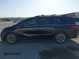 2022 Honda Odyssey EX-L with VIN 5FNRL6H75NB049044, listed as a IAAI auction lot 42010441 with 29,824 mi miles and . Bid and sale history available at DreamBid. Image 14.
