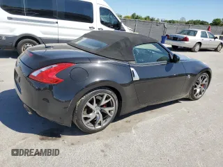 2014 Nissan 370Z Touring with VIN JN1AZ4FH6EM620580, listed as a Copart auction lot 49808725 with 80,591 mi miles and Clean Title. Bid and sale history available at DreamBid. Image 3.
