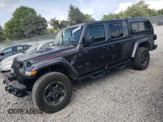 2021 Jeep Gladiator Rubicon with VIN 1C6JJTBG3ML602478, listed as a Copart auction lot 58138705 with 76,759 mi miles and Salvage title. Bid and sale history available at DreamBid. Image 1.