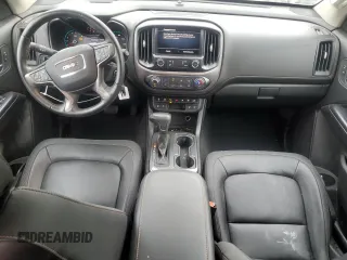 2021 GMC Canyon 4WD AT4 z VIN 1GTG6FEN9M1192443, wystawiony jako Copart lot #54955745 z przebiegiem 1544 mil mil oraz Tytuł czysty. Historia ofert i sprzedaży dostępna na DreamBid. Obrazek 8.