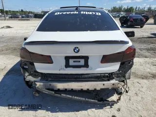 2020 BMW 5 Series 530i z VIN WBAJR3C01LWW68055, wystawiony jako Copart lot #56959985 z przebiegiem Nie podano mil oraz Nie do naprawy • Non repairable. Historia ofert i sprzedaży dostępna na DreamBid. Obrazek 6.