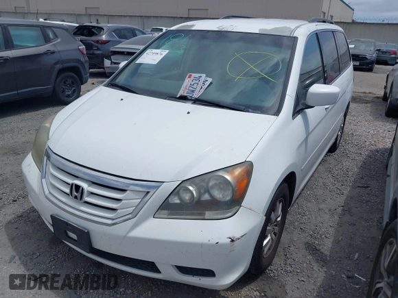2010 Honda Odyssey EX with VIN 5FNRL3H5XAB060547, listed as a IAAI auction lot 42749876 with 228,522 mi miles and . Bid and sale history available at DreamBid. Image 2.