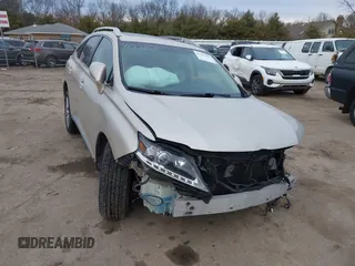 2015 Lexus RX 450h with VIN 2T2BC1BA4FC005711, listed as a IAAI auction lot 41502625 with 142,031 mi miles and . Bid and sale history available at DreamBid. Image 1.