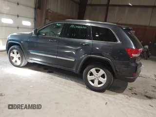 2013 Jeep Grand Cherokee Laredo with VIN 1C4RJFAG9DC583269, listed as a IAAI auction lot 41241085 with 147,995 mi miles. Bid and sale history available at carsss.com. Image 3.
