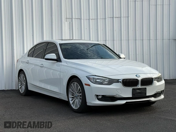 2013 BMW 3 Series 328i with VIN WBA3C1C59DF437433, listed as a Copart auction lot 65803415 with 103,062 mi miles and Clean title. Bid and sale history available at DreamBid. Image 1.