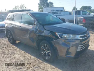 2019 Toyota Highlander LE with VIN 5TDBZRFH6KS945258, listed as a IAAI auction lot 41979698 with 122,624 mi miles and . Bid and sale history available at DreamBid. Image 1.