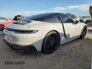 2023 Porsche 911 4S with VIN WP0BB2A9XPS233202, listed as a Copart auction lot 73859314 with 6,490 mi miles and Salvage Title. Bid and sale history available at carsss.com. Image 3.