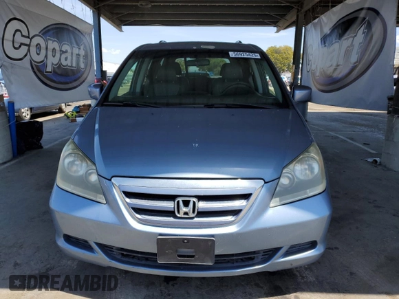 2007 Honda Odyssey EX-L z VIN 5FNRL38647B077250, wystawiony jako Copart lot #56925425 z przebiegiem 159 281 mil mil oraz Szkoda całkowita • Salvage title. Historia ofert i sprzedaży dostępna na DreamBid. Obrazek 5.