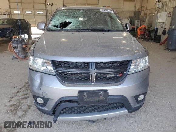 2017 Dodge Journey SXT z VIN 3C4PDDBG7HT592306, wystawiony jako Copart lot #48895015 z przebiegiem 158 289 mil mil oraz Szkoda całkowita • Salvage title. Historia ofert i sprzedaży dostępna na DreamBid. Obrazek 5.