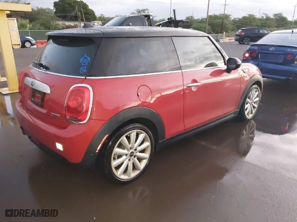 2015 MINI Cooper Hardtop with VIN WMWXM5C59FT938820, listed as a IAAI auction lot 41707992 with 135,545 mi miles. Bid and sale history available at carsss.com. Image 4.