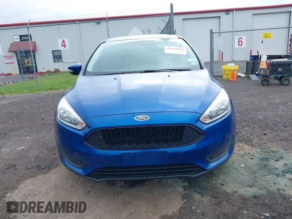 2018 Ford Focus SE z VIN 1FADP3F29JL235302, wystawiony jako IAAI lot #42262964 z przebiegiem 85 127 mil mil oraz . Historia ofert i sprzedaży dostępna na DreamBid. Obrazek 12.