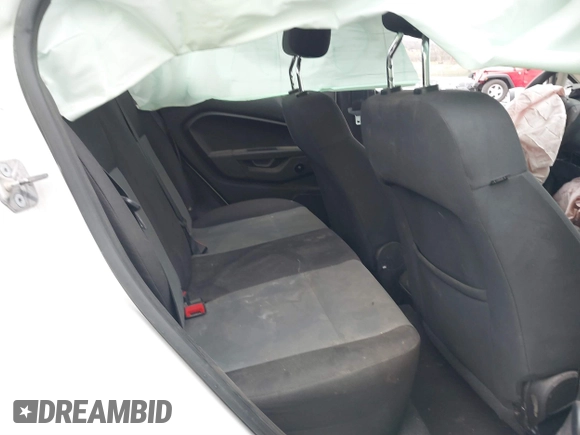 2018 Ford Fiesta S with VIN 3FADP4AJ8JM124873, listed as a IAAI auction lot 41833956 with 86,759 mi miles and . Bid and sale history available at DreamBid. Image 8.