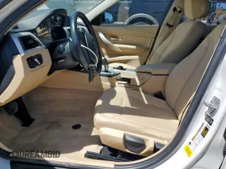 2015 BMW 3 Series 320i with VIN WBA3B1C5XFP831703, listed as a Copart auction lot 57561155 with 135,034 mi miles and Salvage title. Bid and sale history available at DreamBid. Image 7.