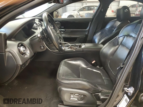 2015 Jaguar XJ with VIN SAJWJ1CD9F8V83885, listed as a Copart auction lot 65625135 with 81,794 mi miles and Clean title. Bid and sale history available at DreamBid. Image 7.