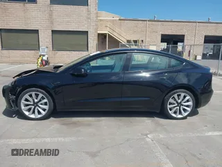 2019 Tesla Model 3 Long Range with VIN 5YJ3E1EB6KF192477, listed as a IAAI auction lot 41981600 with 62,888 mi miles. Bid and sale history available at carsss.com. Image 14.