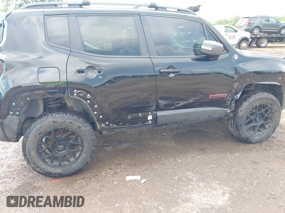 2015 Jeep Renegade Trailhawk z VIN ZACCJBCT9FPB36609, wystawiony jako IAAI lot #42593933 z przebiegiem 106 074 mil mil oraz . Historia ofert i sprzedaży dostępna na DreamBid. Obrazek 6.