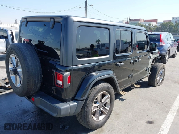 2020 Jeep Wrangler Unlimited Sahara with VIN 1C4HJXEN7LW230214, listed as a IAAI auction lot 41812466 with 59,004 mi miles. Bid and sale history available at carsss.com. Image 4.
