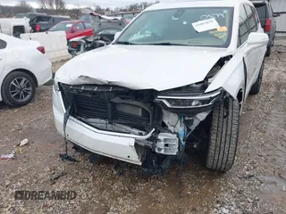 2021 Cadillac XT6 Premium Luxury with VIN 1GYKPFRS0MZ100879, listed as a IAAI auction lot 41083030 with 56,502 mi miles and . Bid and sale history available at DreamBid. Image 6.