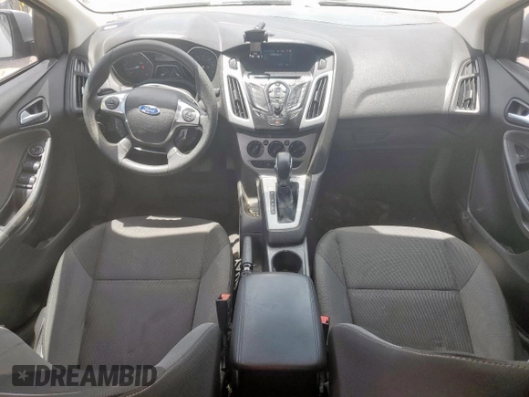 2012 Ford Focus SE with VIN 1FAHP3F29CL287498, listed as a Copart auction lot 61476855 with 139,801 mi miles and Salvage title. Bid and sale history available at DreamBid. Image 8.