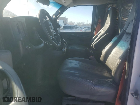 2014 Chevrolet Express Cargo Van with VIN 1GCWGFCB2E1114900, listed as a Copart auction lot 46157065 with 143,434 mi miles and Clean Title. Bid and sale history available at carsss.com. Image 7.