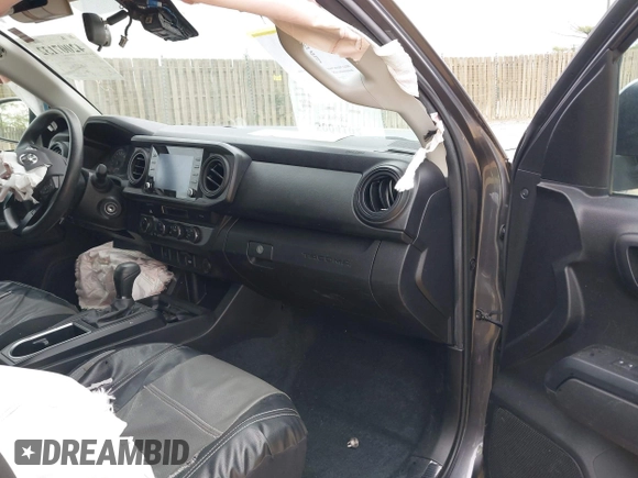 2022 Toyota Tacoma SR with VIN 3TYCZ5AN3NT078324, listed as a IAAI auction lot 42007132 with 35,802 mi miles and . Bid and sale history available at DreamBid. Image 5.