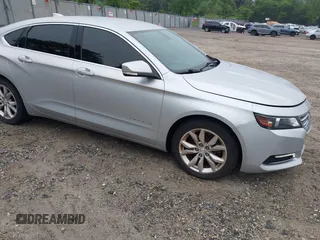 2018 Chevrolet Impala LT z VIN 1G1105S39JU135456, wystawiony jako IAAI lot #42360696 z przebiegiem 124 176 mil mil oraz . Historia ofert i sprzedaży dostępna na DreamBid. Obrazek 1.