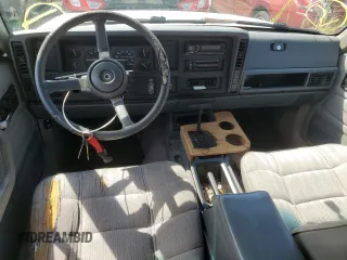 1994 Jeep Cherokee Sport with VIN 1J4FT68S8RL170171, listed as a Copart auction lot 70642694 with 240,165 mi miles and Salvage Title. Bid and sale history available at carsss.com. Image 8.