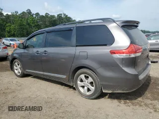 2014 Toyota Sienna LE AAS with VIN 5TDKK3DCXES491979, listed as a Copart auction lot 58493005 with 165,975 mi miles and Salvage title. Bid and sale history available at DreamBid. Image 2.