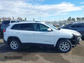 2018 Jeep Cherokee Latitude Plus with VIN 1C4PJLLB0JD584971, listed as a IAAI auction lot 41460976 with 64,100 mi miles. Bid and sale history available at carsss.com. Image 14.