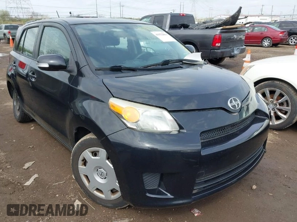 2010 Scion xD with VIN JTKKU4B46AJ053780, listed as a IAAI auction lot 41932064 with 106,330 mi miles. Bid and sale history available at carsss.com. Image 1.