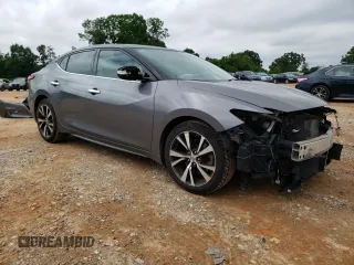 2016 Nissan Maxima S с VIN 1N4AA6AP4GC378207, выставлен на аукционе Copart как лот 58062195 с пробегом 107 167 миль миль и Списание • Salvage title. История ставок и продаж доступна на DreamBid. Изображение 4.