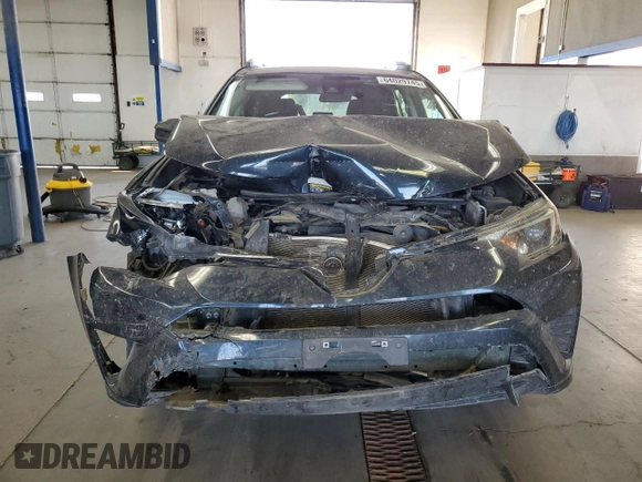 2017 Toyota RAV4 LE with VIN 2T3BFREVXHW578209, listed as a Copart auction lot 64029745 with 51,803 mi miles and Salvage title. Bid and sale history available at DreamBid. Image 12.