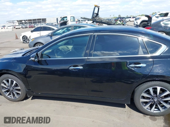 2016 Nissan Altima SR with VIN 1N4AL3AP6GC116956, listed as a IAAI auction lot 42068274 with 148,696 mi miles and . Bid and sale history available at DreamBid. Image 14.