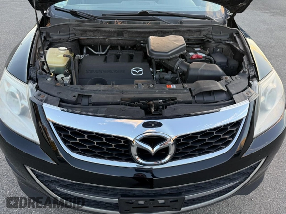 2012 Mazda CX-9 Sport with VIN JM3TB3BV6C0366459, listed as a Copart auction lot 86016734 with 129,416 mi miles and Clean Title. Bid and sale history available at carsss.com. Image 7.