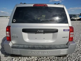 2009 Jeep Patriot with VIN 1J8FF48B49D221606, listed as a Copart auction lot 49596465 with 168,305 mi miles and Salvage title. Bid and sale history available at DreamBid. Image 6.