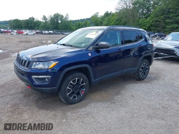2021 Jeep Compass Trailhawk with VIN 3C4NJDDB0MT590442, listed as a IAAI auction lot 42543530 with 66,669 mi miles and . Bid and sale history available at DreamBid. Image 18.
