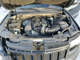 2012 Jeep Grand Cherokee SRT8 with VIN 1C4RJFDJ2CC329621, listed as a Copart auction lot 86772154 with 236,800 mi miles and Salvage Title. Bid and sale history available at carsss.com. Image 12.