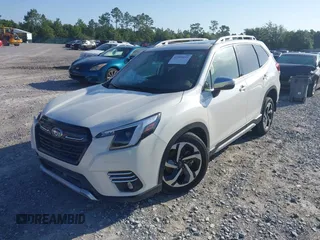 2023 Subaru Forester Touring with VIN JF2SKARC5PH500285, listed as a IAAI auction lot 42509493 with 18,737 mi miles and . Bid and sale history available at DreamBid. Image 2.