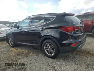2018 Hyundai Santa Fe 2.4L with VIN 5NMZU3LBXJH066406, listed as a Copart auction lot 61388005 with 65,650 mi miles and Salvage title. Bid and sale history available at DreamBid. Image 2.